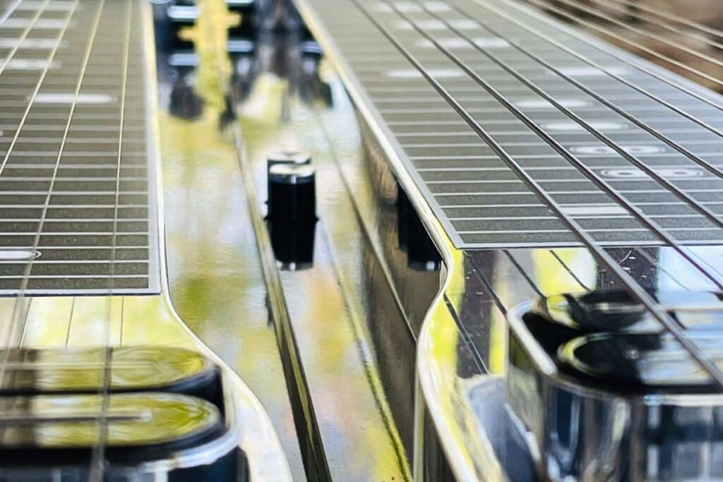 Pedal steel picking hand string positioning