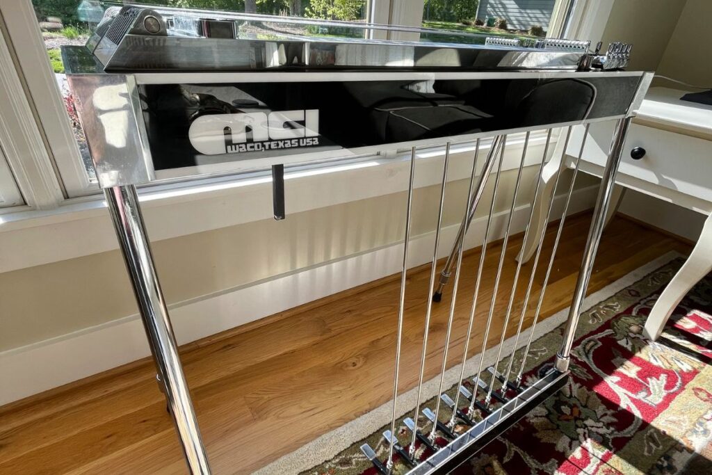 pedal steel instrument by window with light