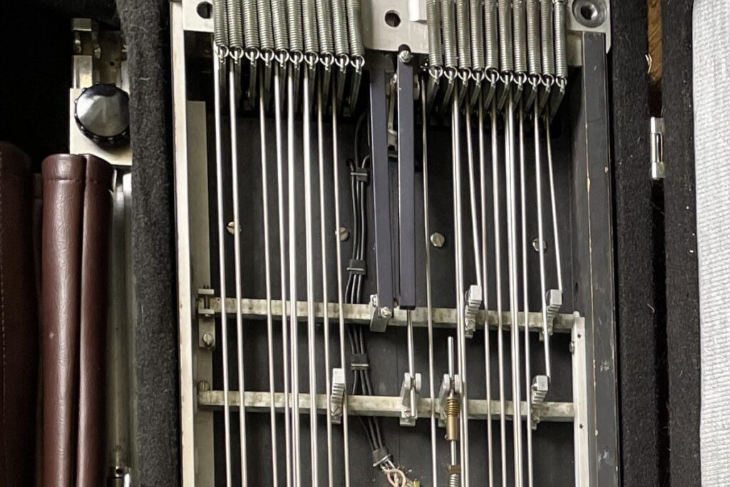 pedal steel undercarriage showing crossrods and changer mechanism
