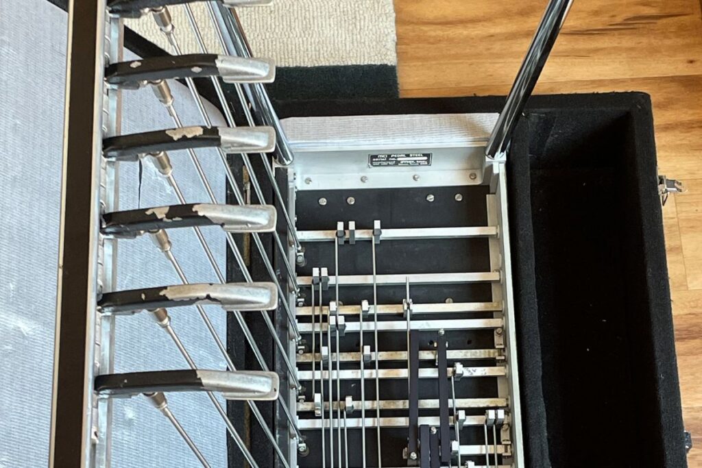 pedals and knee levers of pedal steel guitar from undercarriage view